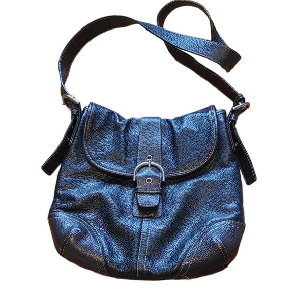 Danier Handbags - Danier Leather purse over the shoulder Bag with a buckle front, adjustable strap